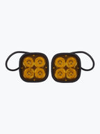 Pair of square amber LED motorcycle auxiliary lights with black housing and cables