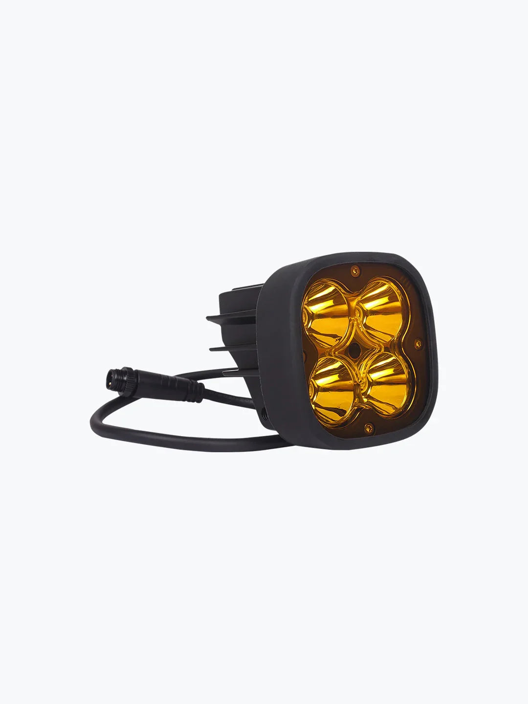 LED motorcycle fog light with yellow lens and black housing, isolated on white background