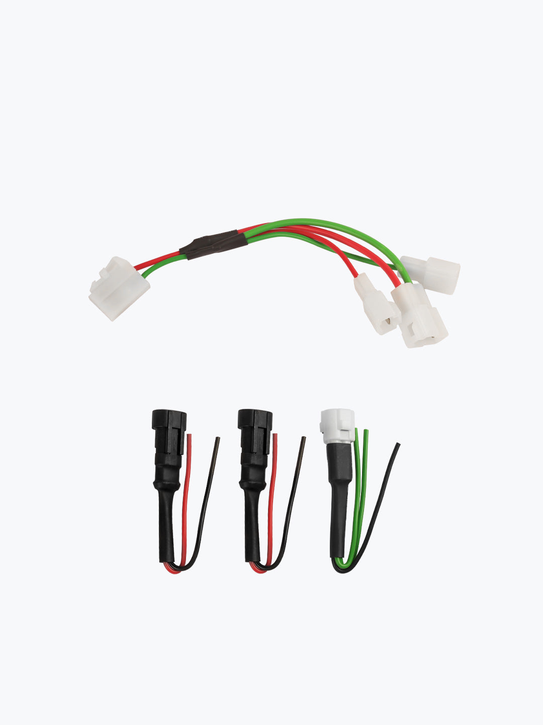 Motorcycle wiring harness adapters and connectors with red, green, black wires on white background