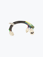 Motorcycle wiring harness with multicolored wires and connector plugs on white background
