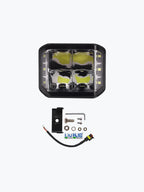 LED motorcycle headlight with mounting hardware and wiring kit on white background