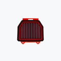 Red rectangular motorcycle air filter with pleated design on white background