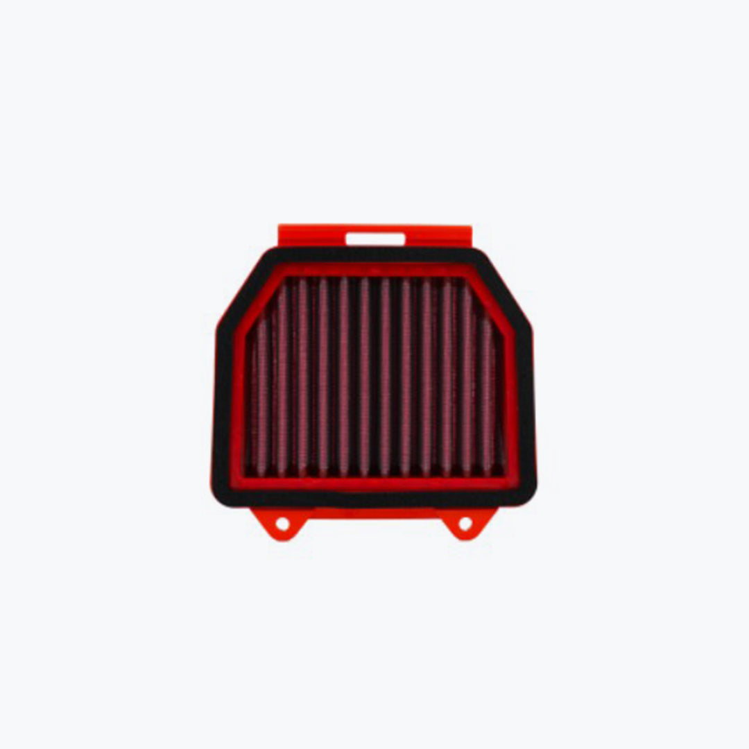 Red rectangular motorcycle air filter with pleated design on white background