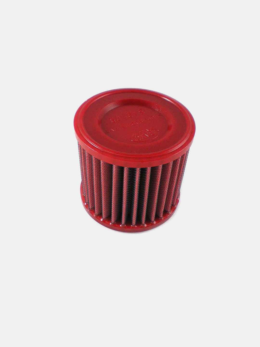 red cylindrical motorcycle air filter isolated on white background