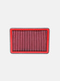 Rectangular red motorcycle air filter with pleated design on white background