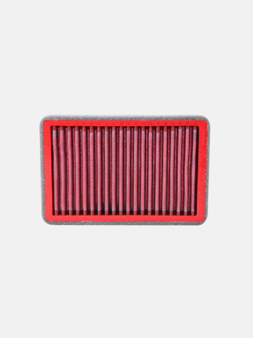Rectangular red motorcycle air filter with pleated design on white background