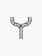 Stainless steel motorcycle exhaust Y-pipe with visible welds on a white background