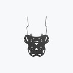 Black metal motorcycle luggage carrier rack with mounting brackets on white background