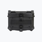 Black motorcycle top box with textured panel and backrest pad, secure latch design