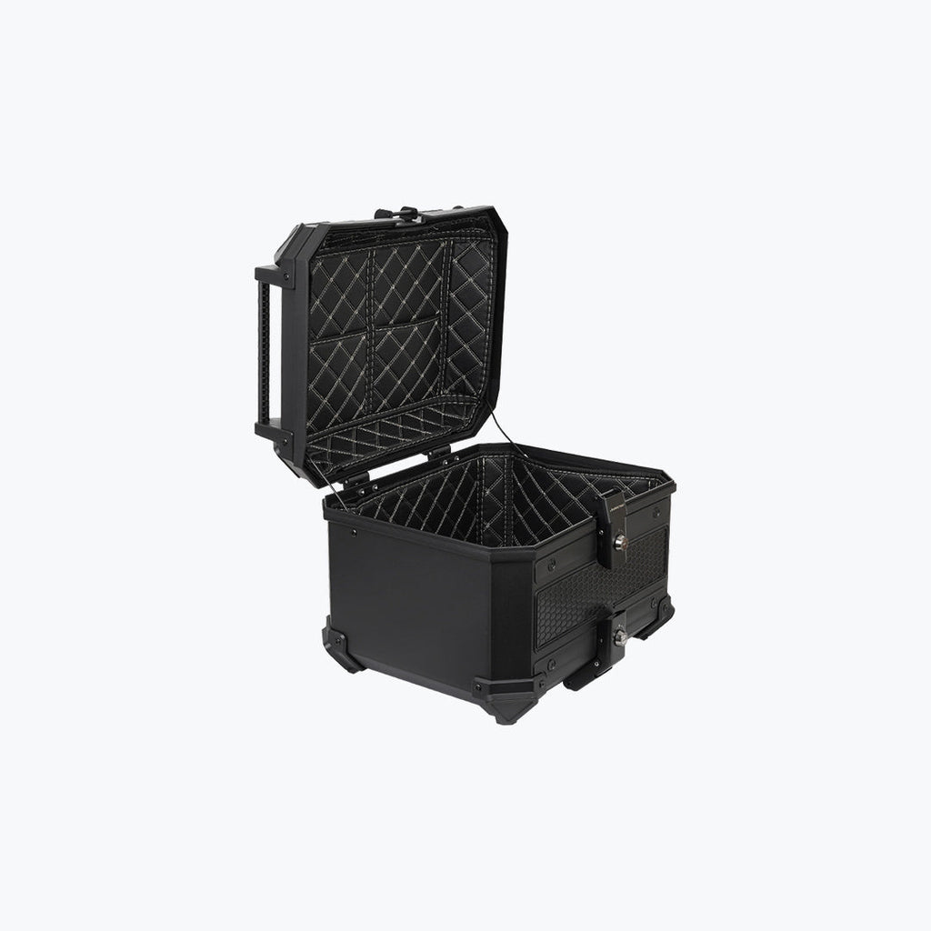 Black motorcycle top box with open lid and quilted interior, featuring backrest pad