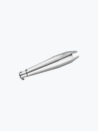 Polished chrome motorcycle exhaust muffler on a white background