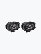 Pair of black oval LED motorcycle fog lights with dual lens design on white background