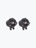 Pair of round black motorcycle fog lights with mounting brackets on white background
