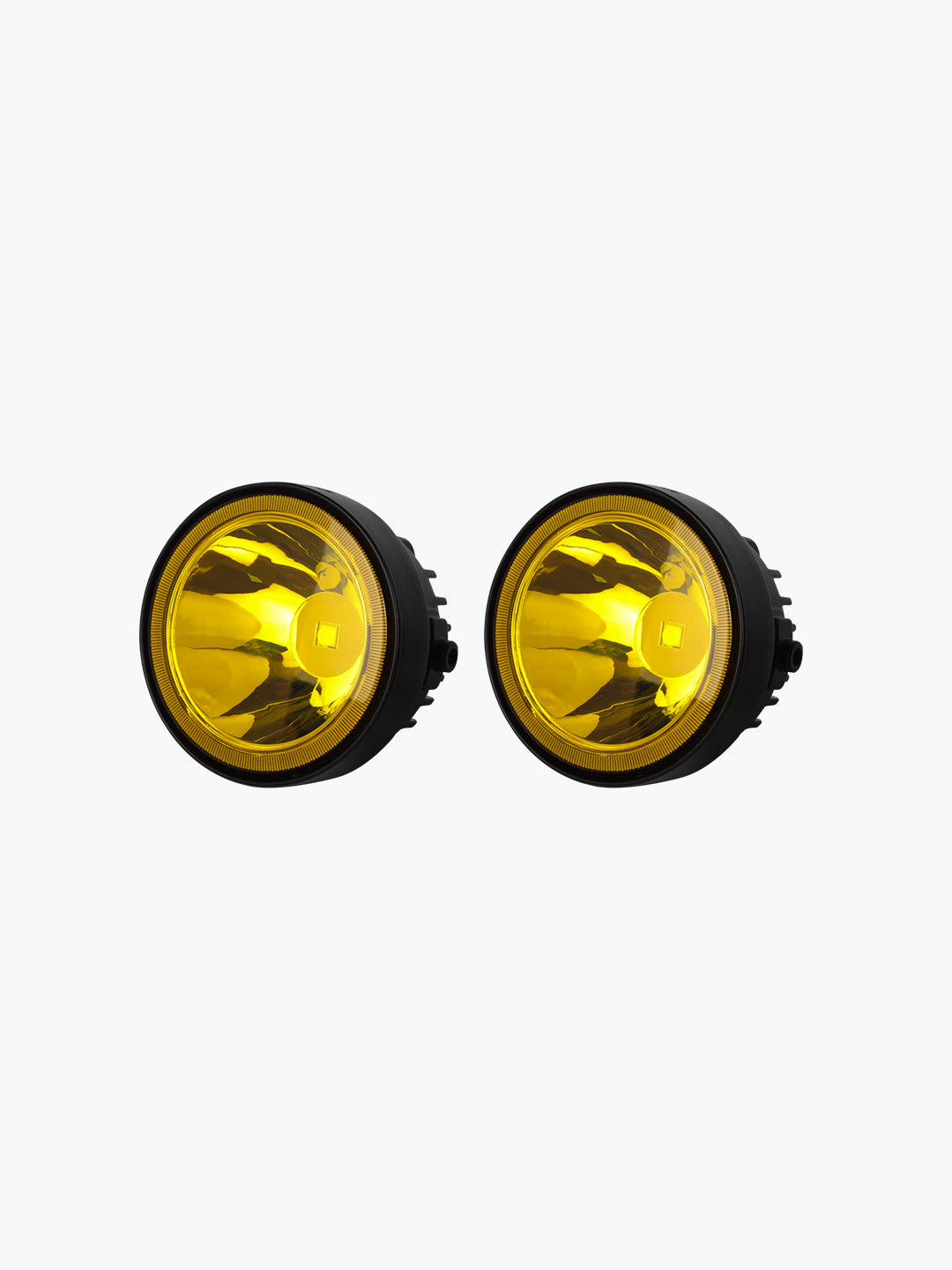 Pair of round yellow motorcycle fog lights with black housing on white background