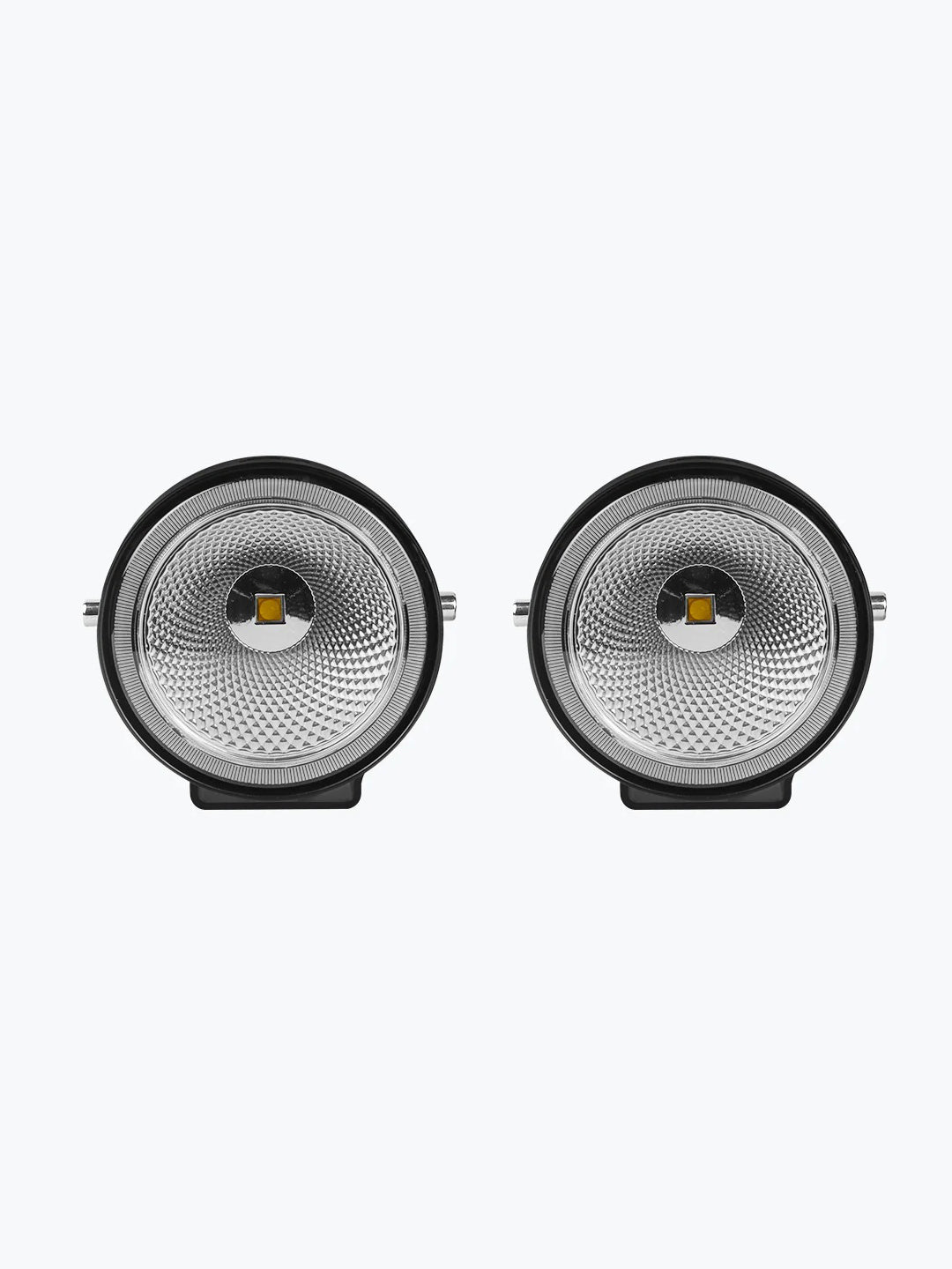 Pair of round vintage mesh fog lights with silver reflector and clear lens