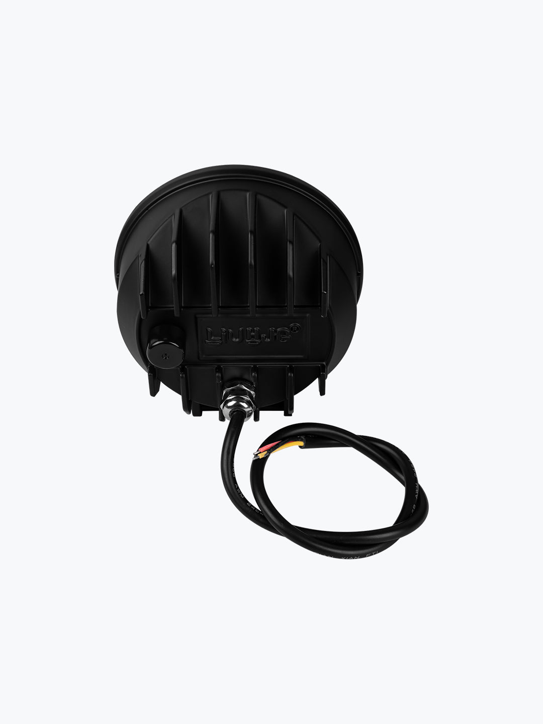 Rear view of black round LED fog light with attached power cable on white background
