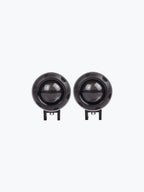 Pair of round grey LED fog lights with clear lenses on white background