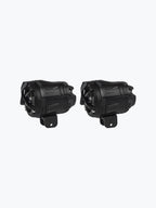 Pair of black motorcycle fog lights with mounting brackets, isolated on white background