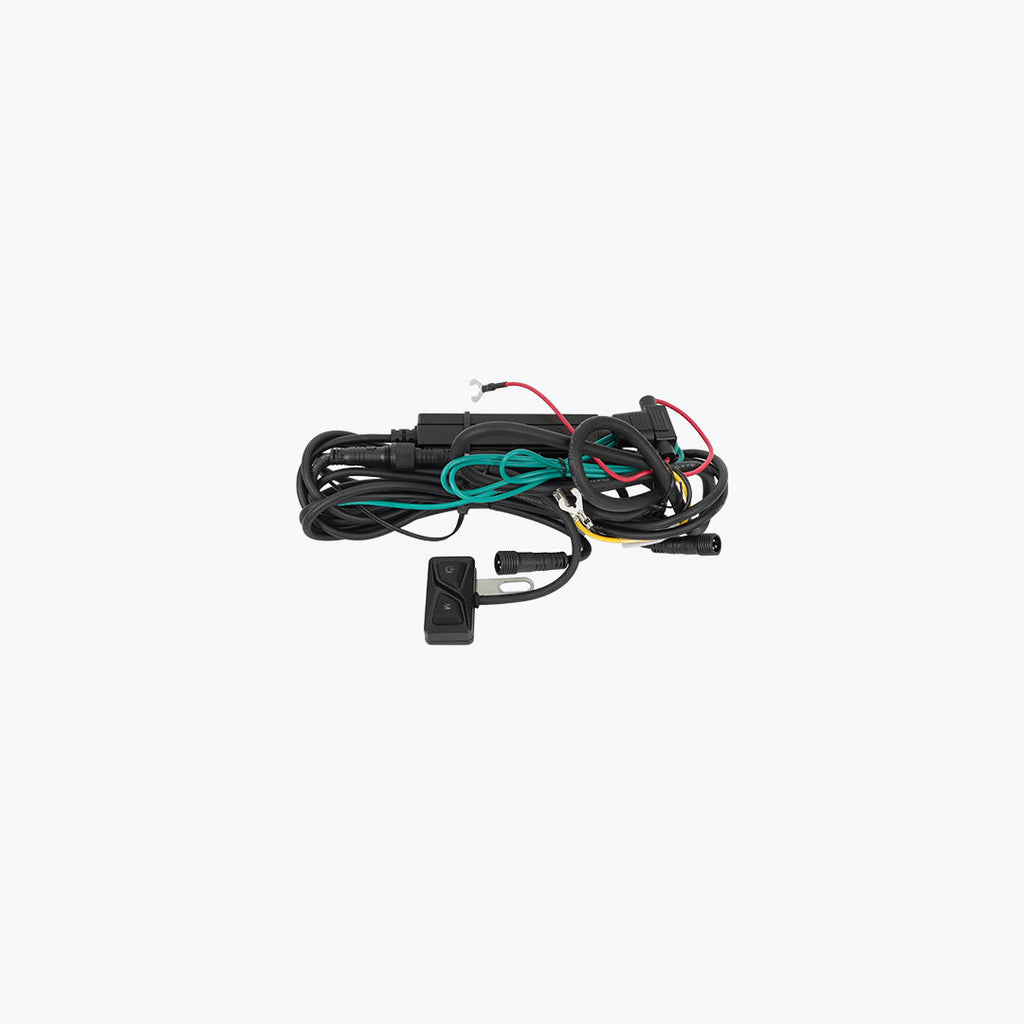 Motorcycle wiring harness with attached switch and multiple colored wires on white background
