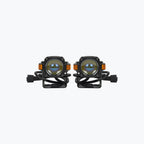 Pair of black motorcycle LED auxiliary fog lights with mounting brackets and wiring
