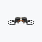 Pair of black motorcycle LED fog lights with wiring and orange reflectors on white background