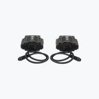 Pair of black motorcycle LED auxiliary lights with attached cables on white background