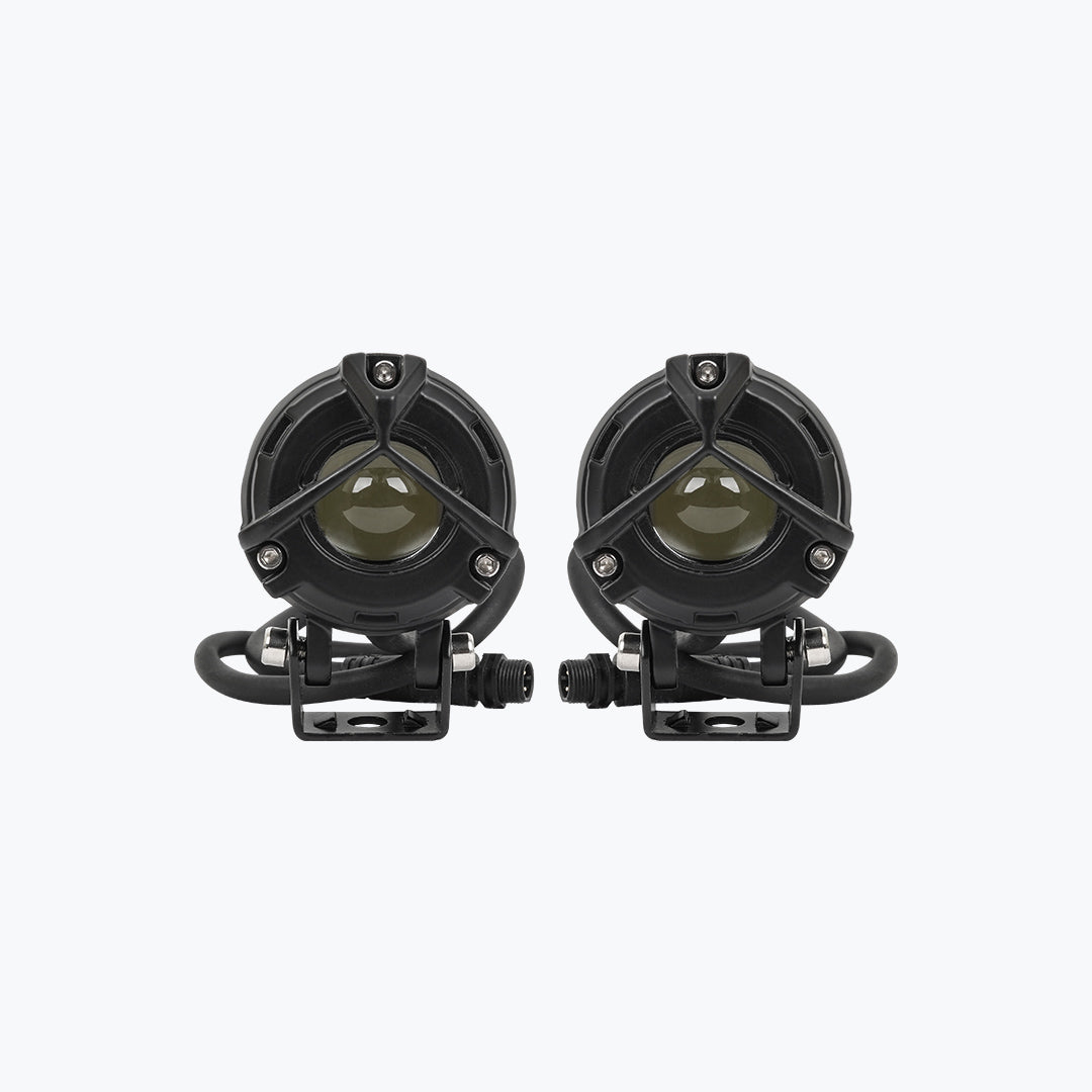 Pair of round black motorcycle LED auxiliary lights with mounting brackets