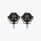 Pair of hexagonal motorcycle LED fog lights with mounting brackets on white background