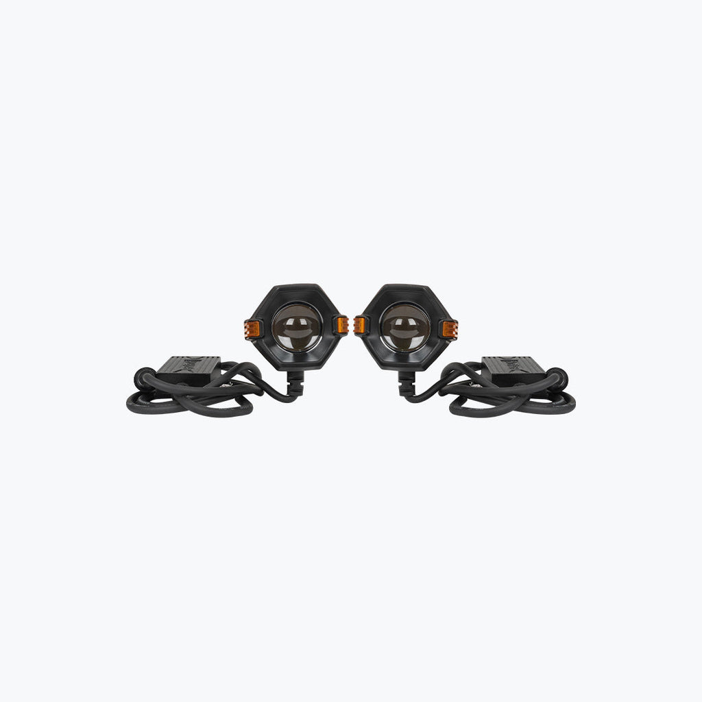 Pair of hexagonal LED motorcycle auxiliary lights with wiring harness on white background