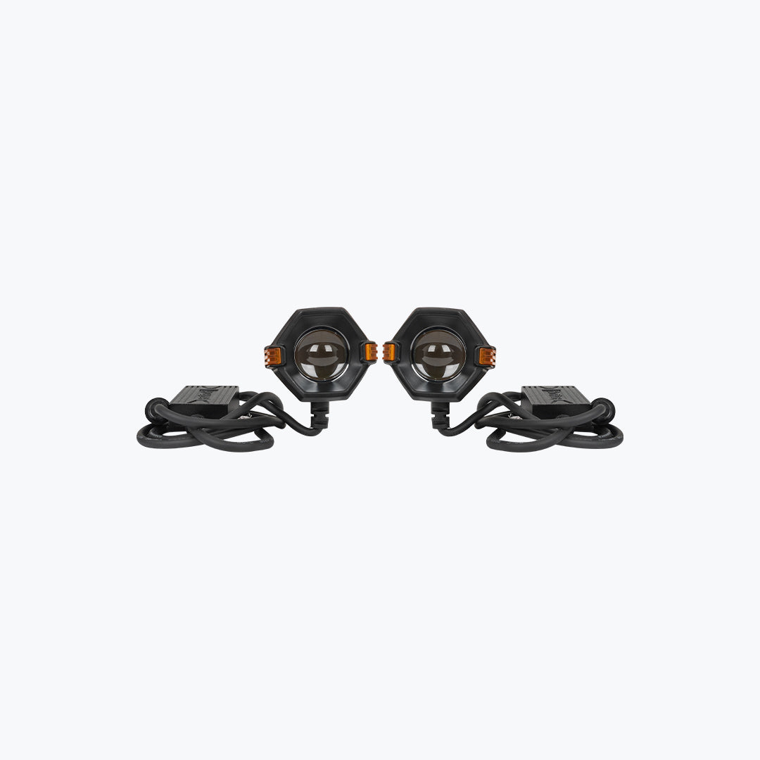 Pair of hexagonal LED motorcycle auxiliary lights with wiring harness on white background