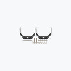 Motorcycle mounting bracket kit with two black brackets, bolts, nuts, and allen key on white background.