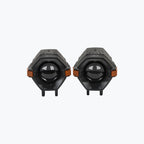 Pair of black motorcycle LED auxiliary lights with amber side markers on white background