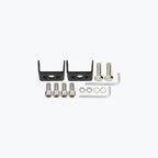 Metal mounting brackets with bolts, washers, and hex keys for motorcycle accessories