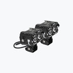 Pair of black motorcycle LED auxiliary lights with rugged casing on a plain background