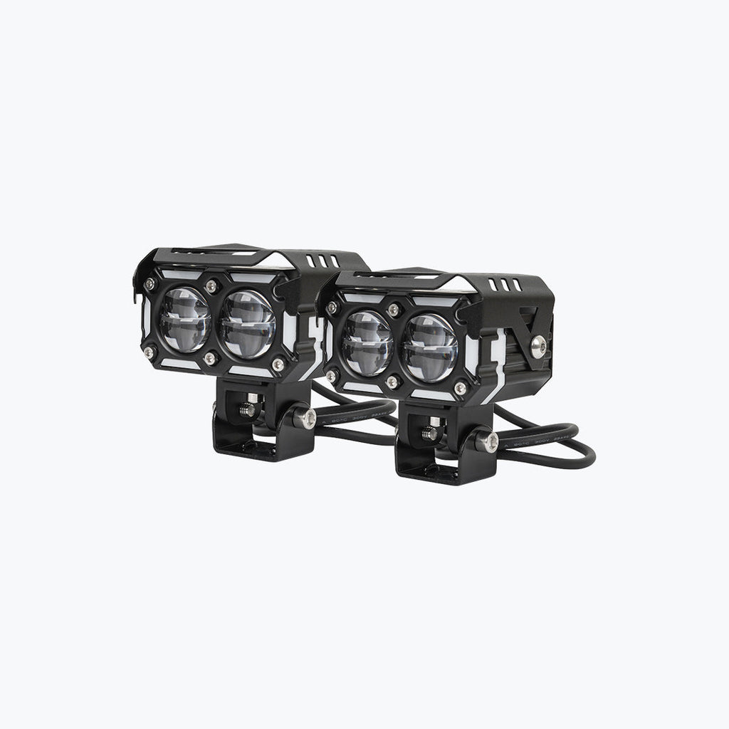 Pair of black dual-LED motorcycle auxiliary lights with protective metal housing