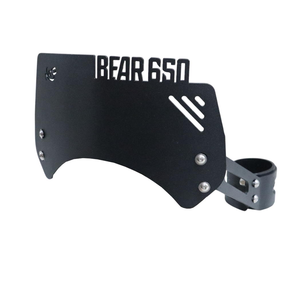 Black metal motorcycle accessory with 'Bear 650' cutout, mounting bracket visible
