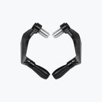 Pair of black carbon fiber motorcycle handlebar lever guards on white background