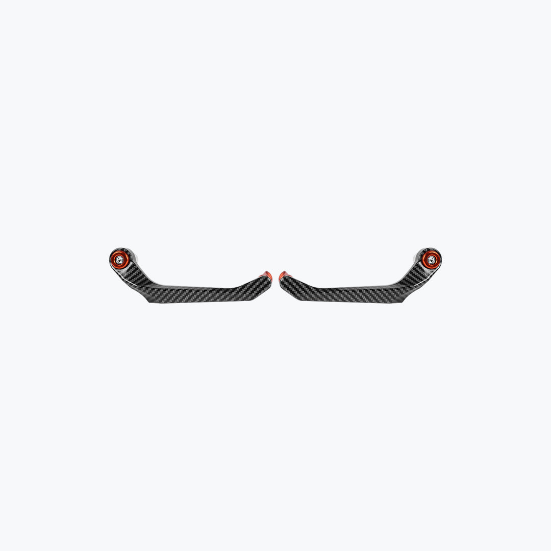 Pair of carbon fiber motorcycle brake and clutch lever guards with red accents on white background