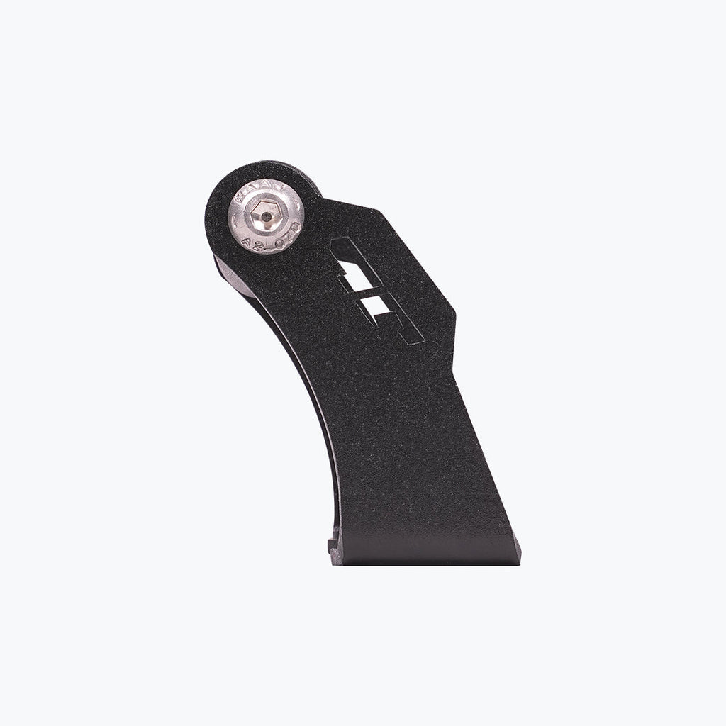 Black metal motorcycle bracket with bolt and geometric cutouts on white background