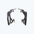 Black motorcycle saddle stay side mounts with angular metal brackets on white background