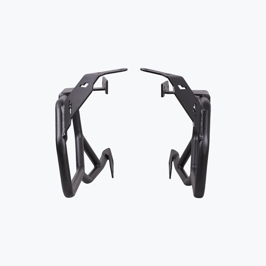 Black motorcycle saddle stay side mounts with angular metal brackets on white background