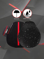 Black and red motorcycle seat cushion with pump, rain cover, water resistant, water droplets visible