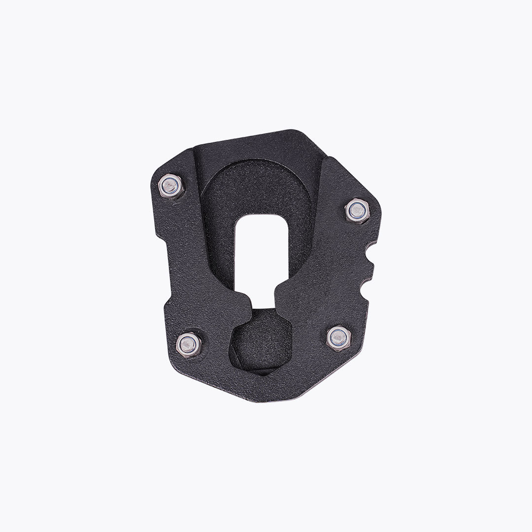 Black motorcycle side stand base plate with bolts, isolated on white background