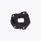 Black motorcycle side stand base plate with mounting bolts on white background