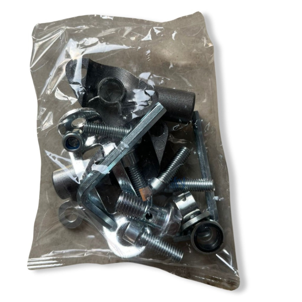 Motorcycle hardware kit with assorted bolts, nuts, and brackets in clear plastic bag