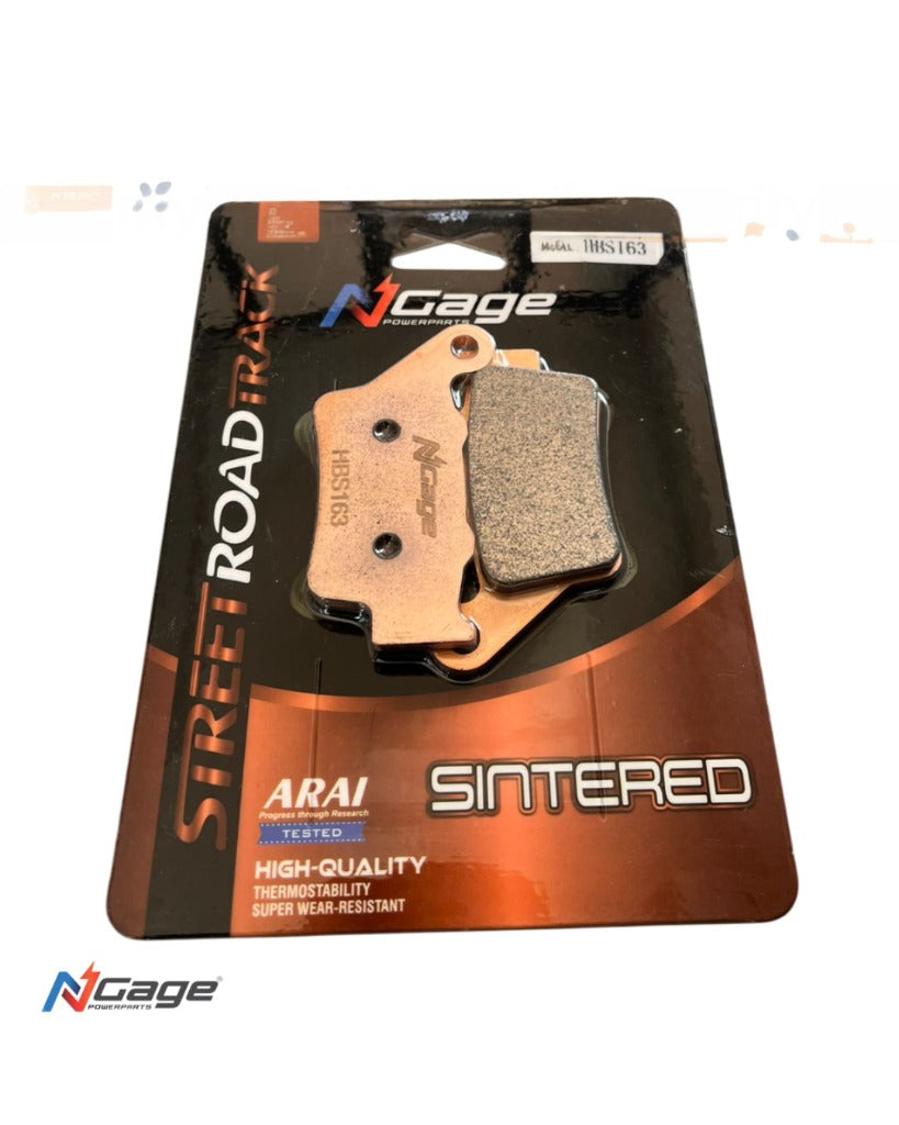 Motorcycle sintered brake pads in retail packaging labeled N-Cage, suitable for street and track use.
