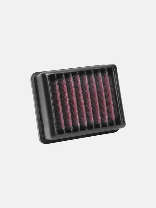 Rectangular motorcycle air filter with pleated red and black design on white background