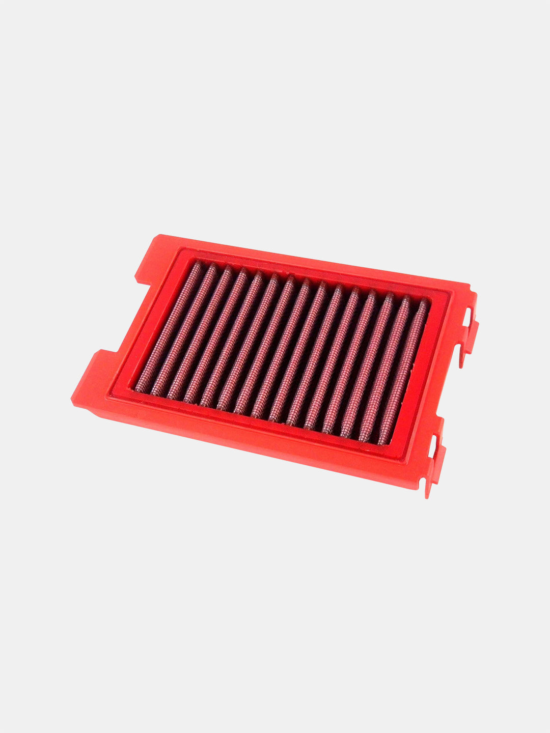 Red rectangular motorcycle air filter with pleated mesh on white background
