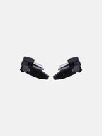 Pair of black motorcycle lever guards with silver bolts on white background