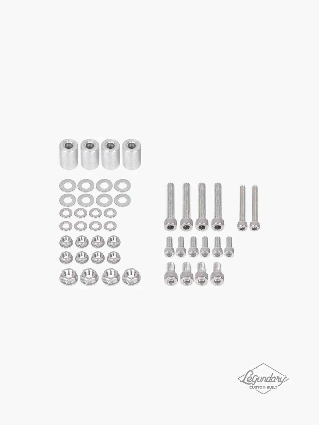 Motorcycle saddle stay and carrier hardware kit with bolts, spacers, washers, and nuts arranged on a white background.